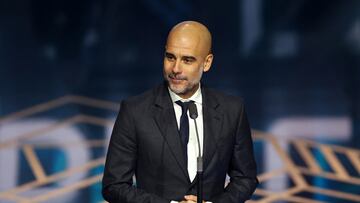 Soccer Football - The Best FIFA Football Awards - Eventim Apollo, London, Britain - January 15, 2024  Manchester City manager Pep Guardiola on stage after winning the best men's coach of 2023 during the awards ceremony REUTERS/Andrew Boyers