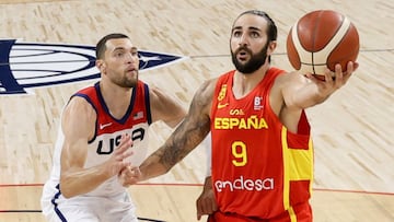 LAS VEGAS, NEVADA - JULY 18: Ricky Rubio #9 of Spain drives to the basket against Zach LaVine #5 of the United States during an exhibition game at Michelob ULTRA Arena ahead of the Tokyo Olympic Games on July 18, 2021 in Las Vegas, Nevada. The United States defeated Spain 83-76.   Ethan Miller/Getty Images/AFP
 == FOR NEWSPAPERS, INTERNET, TELCOS &amp; TELEVISION USE ONLY ==