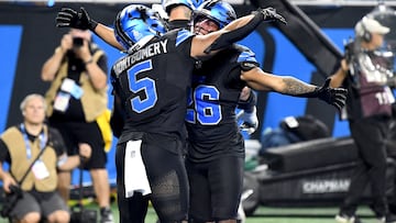 Sep 30, 2024; Detroit, Michigan, USA; Detroit Lions running back Jahmyr Gibbs (26) celebrates with teammate David Montgomery (5) after scoring a touchdown against the Seattle Seahawks in the second quarter at Ford Field. Mandatory Credit: Eamon Horwedel-Imagn Images
