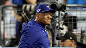 LOS ANGELES, CALIFORNIA - OCTOBER 11: Manager Dave Roberts #30 of the Los Angeles Dodgers smiles after a 5-3 win over the San Diego Padres in game one of the National League Division Series at Dodger Stadium on October 11, 2022 in Los Angeles, California.   Harry How/Getty Images/AFP