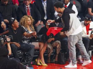 Drake junto al cantate Jay-Z y Beyonce en el All Star de 2013.