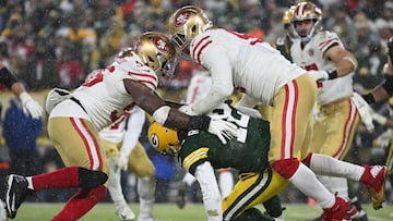 GREEN BAY, WISCONSIN - JANUARY 22: Quarterback Aaron Rodgers #12 of the Green Bay Packers is sacked by defensive end Arik Armstead #91of the San Francisco 49ers during the 4th quarter of the NFC Divisional Playoff game against the San Francisco 49ers at Lambeau Field on January 22, 2022 in Green Bay, Wisconsin.   Quinn Harris/Getty Images/AFP
 == FOR NEWSPAPERS, INTERNET, TELCOS &amp; TELEVISION USE ONLY ==