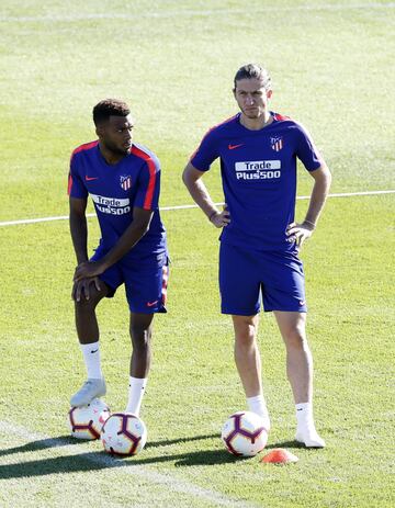 Lemar y Filipe Luis.