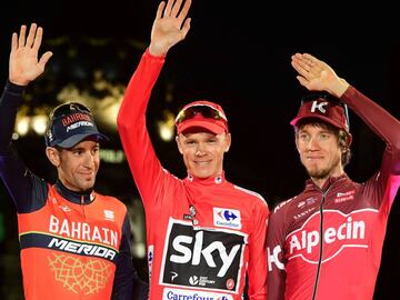 Team Sky&#039;s British cyclist Chris Froome celebrates on the podium winning the 72nd edition of &quot;La Vuelta&quot; Tour of Spain cycling race, between second placed Bahrain-Merida&#039;s Italian cyclist Vincenzo Nibali (L) and third placed Team Katusha Alpecin&#039;s Russian cyclist Ilnur Zakarin (R), in Madrid, on September 10, 2017.
 Chris Froome became just the third rider in history to win the Vuelta a Espana and Tour de France in the same year as Matteo Trentin won the 21st stage of the Vuelta through the centre on Madrid on Sunday. / AFP PHOTO / JOSE JORDAN  VUELTA ESPA&Atilde;A 2017 ULTIMA VUELTA 
 PODIO 
 PUBLICADA 11/09/17 NA MA05 1COL