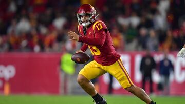 Oct 7, 2023; Los Angeles, California, USA; Southern California Trojans quarterback Caleb Williams (13) runs the ball during the second overtime against the Arizona Wildcats at Los Angeles Memorial Coliseum. Mandatory Credit: Gary A. Vasquez-USA TODAY Sports