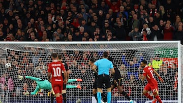 Soccer Football - Champions League - Liverpool v Bologna - Anfield, Liverpool, Britain - October 2, 2024 Liverpool's Mohamed Salah scores their second goal past Bologna's Lukasz Skorupski REUTERS/Molly Darlington