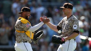 SAN DIEGO, CALIFORNIA - APRIL 13: Elias D�az #17 congratulates Michael King #34 of the San Diego Padres after the Padres defeated the Colorado Rockies 10-3 in a game at Petco Park on April 13, 2025 in San Diego, California. Sean M. Haffey/Getty Images/AFP (Photo by Sean M. Haffey / GETTY IMAGES NORTH AMERICA / Getty Images via AFP)