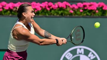 Aryna Sabalenka of Belarus hits a backhand return to Coco Gauff of the US in their quarterfinal tennis match at the 2023 WTA Indian Wells Open on March 15, 2023 in Indian Wells, California. (Photo by Frederic J. BROWN / AFP)