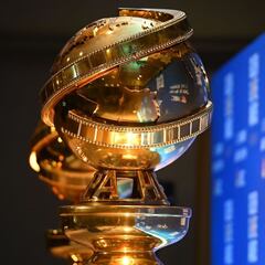 What movies and TV shows have received the most Golden Globe awards and nominations?