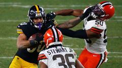 PITTSBURGH, PENNSYLVANIA - JANUARY 10: James Conner #30 of the Pittsburgh Steelers is pursued by Jacob Phillips #50 of the Cleveland Browns during the second half of the AFC Wild Card Playoff game at Heinz Field on January 10, 2021 in Pittsburgh, Pennsylv