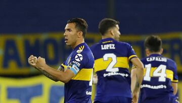 Soccer Football - Copa Libertadores -  Round of 16 - Second Leg - Boca Juniors v Internacional - Estadio La Bombonera, Buenos Aires, Argentina - December 9, 2020 Boca Juniors&#039; Carlos Tevez celebrates after winning the penalty shootout Pool via REUTERS/Agustin Marcarian