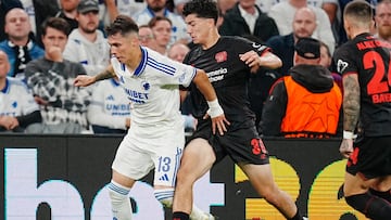 FC Copenhagen's Mexican defender #13 Rodrigo Huescas (L) and Bayer Leverkusen's Algerian midfielder #30 Ibrahim Maza (R) vie for the ball during the UEFA Champions League league phase day 1 football match between FC Copenhagen and Bayer Leverkusen in Copenhagen, Denmark, on September 18, 2025. (Photo by Liselotte Sabroe / Ritzau Scanpix / AFP) / Denmark OUT