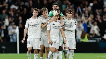 Real Madrid's Turkish midfielder #15 Arda Guler (C) celebrates scoring his team's fourth goal during the Spanish league football match between Real Madrid CF and Elche CF at the Santiago Bernabeu Stadium in Madrid on March 14, 2026. (Photo by Oscar DEL POZO / AFP)