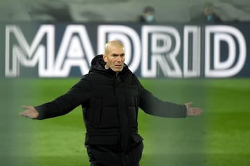 (FILES) In this file photo taken on December 12, 2020 Real Madrid's French coach Zinedine Zidane gestures on the sideline during the Spanish league football match between Real Madrid CF and Club Atletico de Madrid at the Alfredo di Stefano stadium in Madr