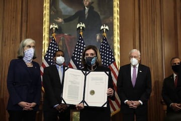 US House Speaker Nancy Pelosi signs the article of the impeachment against President Donald Trump on 13 January 2021.