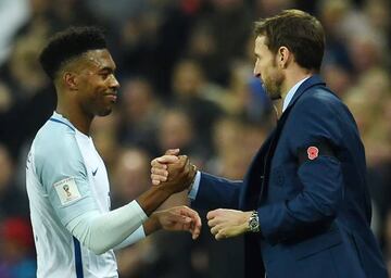 England manager Gareth Southgate congratulates England's Daniel Sturridge after he opens the scoring against Scotland.