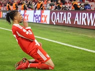 Bayern Munich's French midfielder #17 Michael Olise celebrates scoring the 4-3 goal during the UEFA Champions League quarter-final second leg football match between FC Bayern Munich and Real Madrid in Munich, southern Germany, on April 15, 2026. (Photo by Alexandra BEIER / AFP)