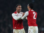 Soccer Football - Carabao Cup - Semi Final - Second Leg - Arsenal v Chelsea - Emirates Stadium, London, Britain - February 3, 2026 Arsenal's Gabriel Magalhaes celebrates after the match with William Saliba Action Images via Reuters/Paul Childs EDITORIAL USE ONLY. NO USE WITH UNAUTHORIZED AUDIO, VIDEO, DATA, FIXTURE LISTS, CLUB/LEAGUE LOGOS OR 'LIVE' SERVICES. ONLINE IN-MATCH USE LIMITED TO 120 IMAGES, NO VIDEO EMULATION. NO USE IN BETTING, GAMES OR SINGLE CLUB/LEAGUE/PLAYER PUBLICATIONS. PLEASE CONTACT YOUR ACCOUNT REPRESENTATIVE FOR FURTHER DETAILS..