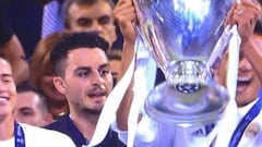 Gatecrasher lifts the trophy with the Real Madrid players