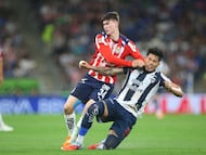 Guadalajara's forward #34 Armando Gonzalez and Monterrey's defender #13 Carlos Salcedo fight for the ball during the Liga MX Clausura football match between Monterrey and Guadalajara at the BBVA Stadium in Monterrey, Mexico, on March 21, 2026. (Photo by Julio Cesar AGUILAR / AFP)