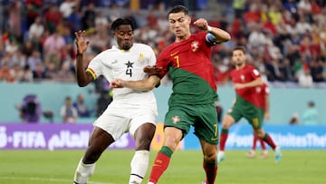 Soccer Football - FIFA World Cup Qatar 2022 - Group H - Portugal v Ghana - Stadium 974, Doha, Qatar - November 24, 2022 Ghana's Mohammed Salisu concedes a penalty against Portugal's Cristiano Ronaldo REUTERS/Carl Recine