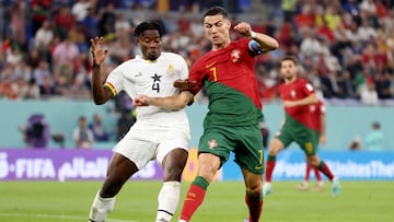 Soccer Football - FIFA World Cup Qatar 2022 - Group H - Portugal v Ghana - Stadium 974, Doha, Qatar - November 24, 2022  Ghana's Mohammed Salisu concedes a penalty against Portugal's Cristiano Ronaldo REUTERS/Carl Recine