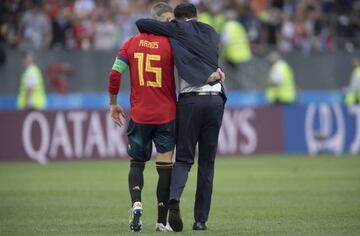 Hierro and Ramos walk off the field after the loss to Russia.