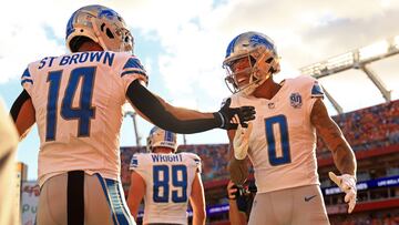 Marvin Jones Jr. #0 and Amon-Ra St. Brown #14 of the Detroit Lions.