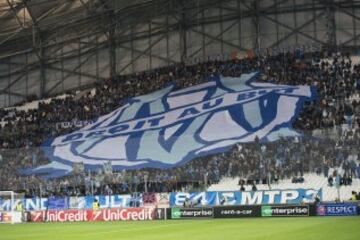 Marseille fans unfurl a tifo in the Stade Velodrome.