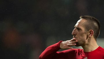 (FILES) In this file photo taken on December 7, 2013 Bayern Munich's French midfielder Franck Ribery blows a kiss to someone in the crowd after the German first division Bundesliga football match between SV Werder Bremen and FC Bayern Munich in Bremen, northern Germany. (Photo by John MACDOUGALL / AFP)