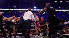 Boxing - Logan Paul v Dillon Danis - AO Arena, Manchester, Britain - October 14, 2023  Dillon Danis clashes with Logan Paul as security comes onto the ring Action Images via Reuters/Jason Cairnduff