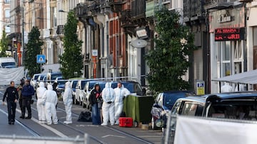 Police officers work outside the site of a police operation against a deadly shooting suspect, in Schaerbeek, Brussels, Belgium, October 17, 2023. REUTERS/Yves Herman