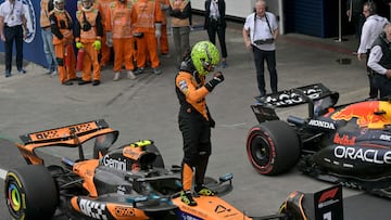 McLaren's British driver Lando Norris celebrates after winning the Sao Paulo Formula One Grand Prix at the Jose Carlos Pace racetrack, aka Interlagos, in Sao Paulo, Brazil on November 9, 2025. (Photo by Nelson ALMEIDA / AFP)