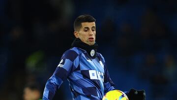 Soccer Football - Premier League - Manchester City v Tottenham Hotspur - Etihad Stadium, Manchester, Britain - January 19, 2023 Manchester City's Joao Cancelo during the warm up before the match REUTERS/Molly Darlington EDITORIAL USE ONLY. No use with unauthorized audio, video, data, fixture lists, club/league logos or 'live' services. Online in-match use limited to 75 images, no video emulation. No use in betting, games or single club /league/player publications.  Please contact your account representative for further details.