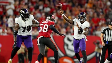 TAMPA, FLORIDA - OCTOBER 27: Lamar Jackson #8 of the Baltimore Ravens throws a pass against the Tampa Bay Buccaneers during the second quarter at Raymond James Stadium on October 27, 2022 in Tampa, Florida. Mike Ehrmann/Getty Images/AFP