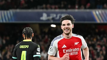 Arsenal's English midfielder #41 Declan Rice celebrates after scoring his team second goal during the last 16 second leg UEFA Champions League football match between Arsenal and PSV Eindhoven at the Emirates Stadium in north London on March 12, 2025. (Photo by Glyn KIRK / AFP)