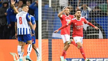 Benfica's Portuguese midfielder Rafa Silva (R) celebrates after scoring his team's first goal during the Portuguese league football match between FC Porto and SL Benfica at the Dragao stadium in Porto, on October 21, 2022. (Photo by MIGUEL RIOPA / AFP) (Photo by MIGUEL RIOPA/AFP via Getty Images)