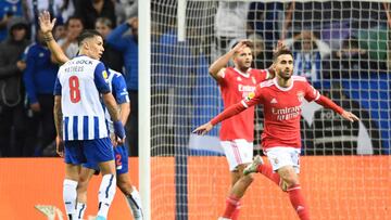 Benfica's Portuguese midfielder Rafa Silva (R) celebrates after scoring his team's first goal during the Portuguese league football match between FC Porto and SL Benfica at the Dragao stadium in Porto, on October 21, 2022. (Photo by MIGUEL RIOPA / AFP) (Photo by MIGUEL RIOPA/AFP via Getty Images)