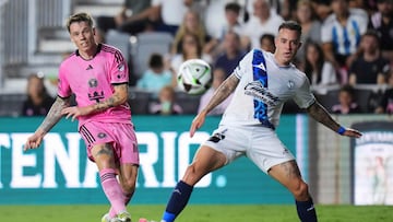 FORT LAUDERDALE, FLORIDA - JULY 27: Robert Taylor #16 of Inter Miami CF shots the ball against Gustavo Ferrareis #2 of Puebla in the first half during the Leagues Cup 2024 match between Inter Miami CF and Puebla at Chase Stadium on July 27, 2024 in Fort Lauderdale, Florida. Rich Storry/Getty Images/AFP (Photo by Rich Storry / GETTY IMAGES NORTH AMERICA / Getty Images via AFP)