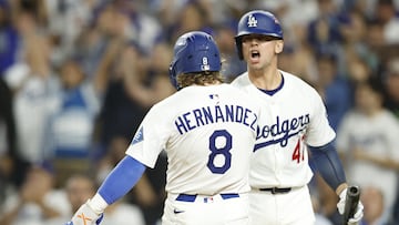 LOS ANGELES (United States), 02/10/2025.- Los Angeles Dodgers left fielder Enrique Hernandez (L) reacts with Los Angeles Dodgers catcher Ben Rortvedt (R) after scoring during the fourth inning of game 2 of the Major League Baseball (MLB) National League Wild Card series between the Los Angeles Dodgers and the Cincinnati Reds in Los Angeles, California, USA, 01 October 2025. EFE/EPA/CAROLINE BREHMAN