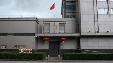 The Chinese flag flies outside of the Chinese consulate in Houston after the US State Department ordered China to close the consulate in Houston, Texas, July 22, 2020. - US-Chinese tensions, already rising because of the coronavirus pandemic and crackdown in Hong Kong, ratcheted up another notch on Wednesday as the US ordered the closure of the Chinese consulate in Houston within 72 hours. China reacted angrily to the US move, which came a day after the unveiling of a US indictment of two Chinese nationals for allegedly hacking hundreds of companies worldwide. (Photo by Mark Felix / AFP)