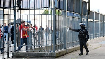The chaos that ensued ahead of the Champions League game Saturday is the fault of English fans with fake tickets, according to the French Sports Minister.