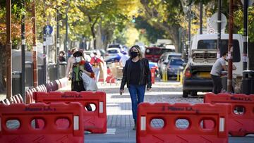 BUENOS AIRES, ARGENTINA - MAY 12: Women wearing face mask walk through a pedestrian Chinatown street as local stores reopened during government-ordered lockdown to halt spread of Covid-19 on May 12, 2020 in Buenos Aires, Argentina. Argentina will continue on national quarantine until May 24, adding exceptions specially in the rural areas to slowly reopen economy. (Photo by Marcelo Endelli/Getty Images)