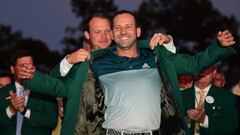 AUGUSTA, GA - APRIL 09: Danny Willett of England presents Sergio Garcia of Spain with the Green Jacket after Garcia won in a playoff during the final round of the 2017 Masters Tournament at Augusta National Golf Club on April 9, 2017 in Augusta, Georgia.   Harry How/Getty Images/AFP
 == FOR NEWSPAPERS, INTERNET, TELCOS &amp; TELEVISION USE ONLY ==