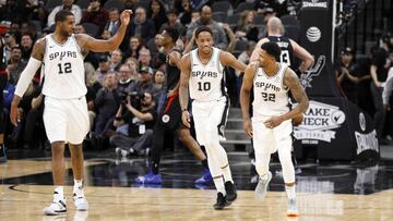 Dec 13, 2018; San Antonio, TX, USA; San Antonio Spurs small forward Rudy Gay (22) celebrates with DeMar DeRozan (10), and LaMarcus Aldridge (12) after a play during the second half against the LA Clippers at AT&amp;T Center. Mandatory Credit: Soobum Im-USA TODAY Sports