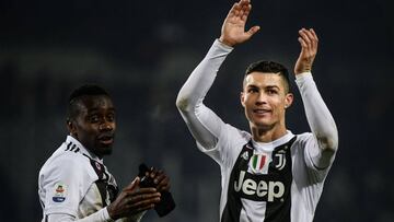 Juventus&#039; French midfielder Blaise Matuidi (L) and Juventus&#039; Portuguese forward Cristiano Ronaldo celebrate at the end of the Italian Serie A football match Torino vs Juventus on December 15, 2018 at the Olympic stadium in Turin. (Photo by Marco