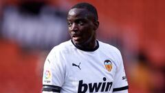 Valencia walk off after Diakhaby accuses Cádiz player of racist abuse