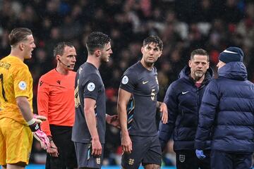 John Stones leaves the pitch after being injured during the match between England and Belgium.