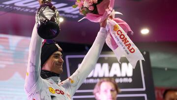 UAE Team Emirates XRG's Mexican rider Isaac Del Toro celebrates the White Jersey on the podium of the 10th stage of the 108th Giro d'Italia cycling race of 28.6kms individual time-trial from Lucca to Pisa on May 20, 2025. (Photo by Luca Bettini / AFP)
