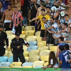 The Word Cup qualifier at the Maracana was marred by violence in the stands as supporters clashed with police, forcing organisers to delay kick-off.